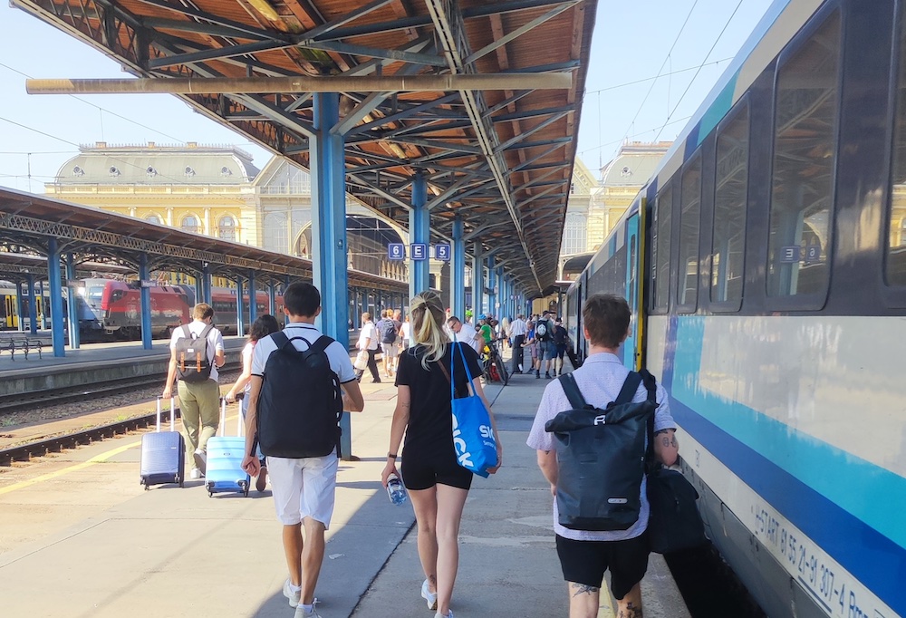 People walking at a train station